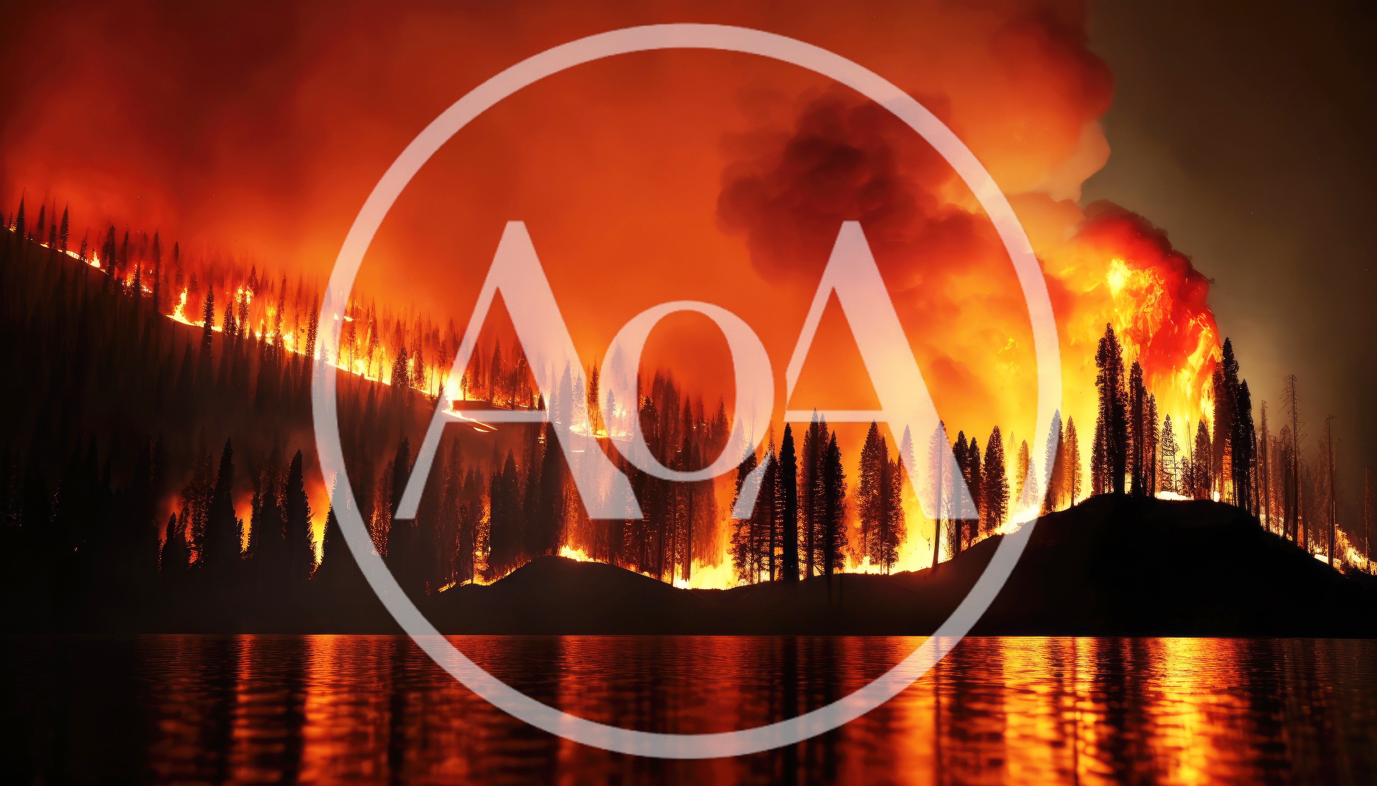 Intense Forest Fire Burning Along A Lake Shore