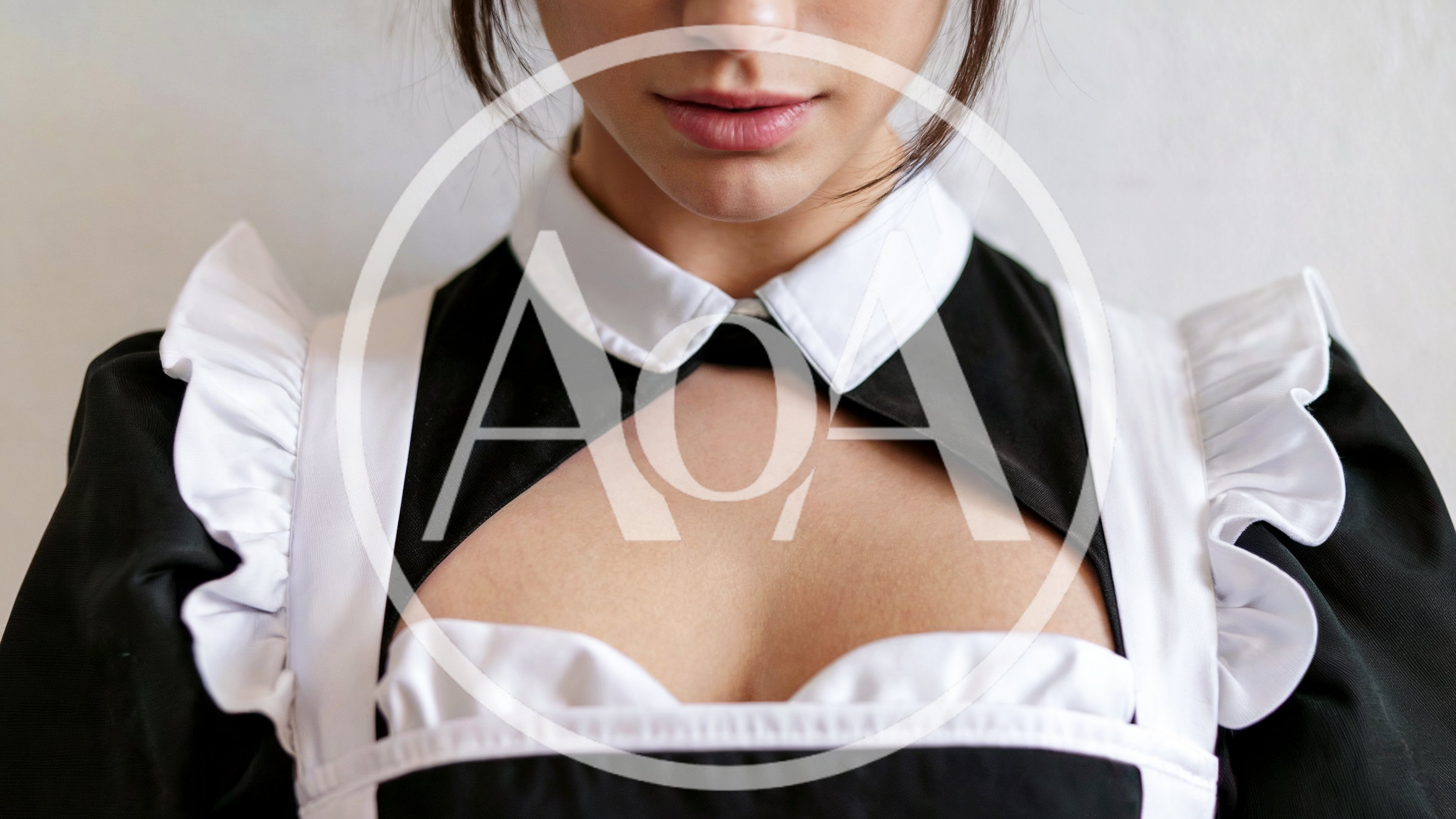 Close Up Of A Woman Wearing A Maid Costume