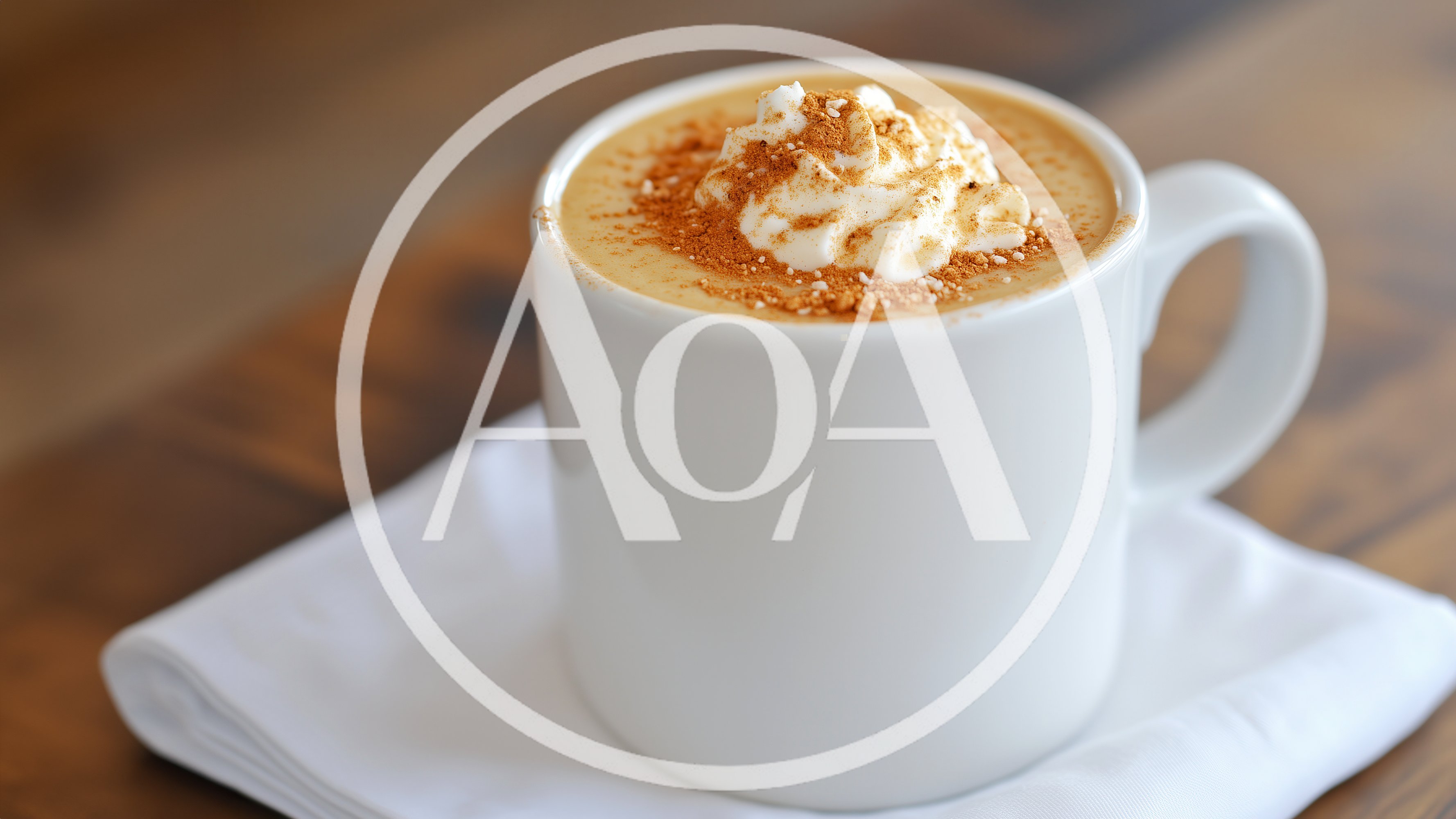 White Mug Of Coffee With Whipped Cream And Cinnamon