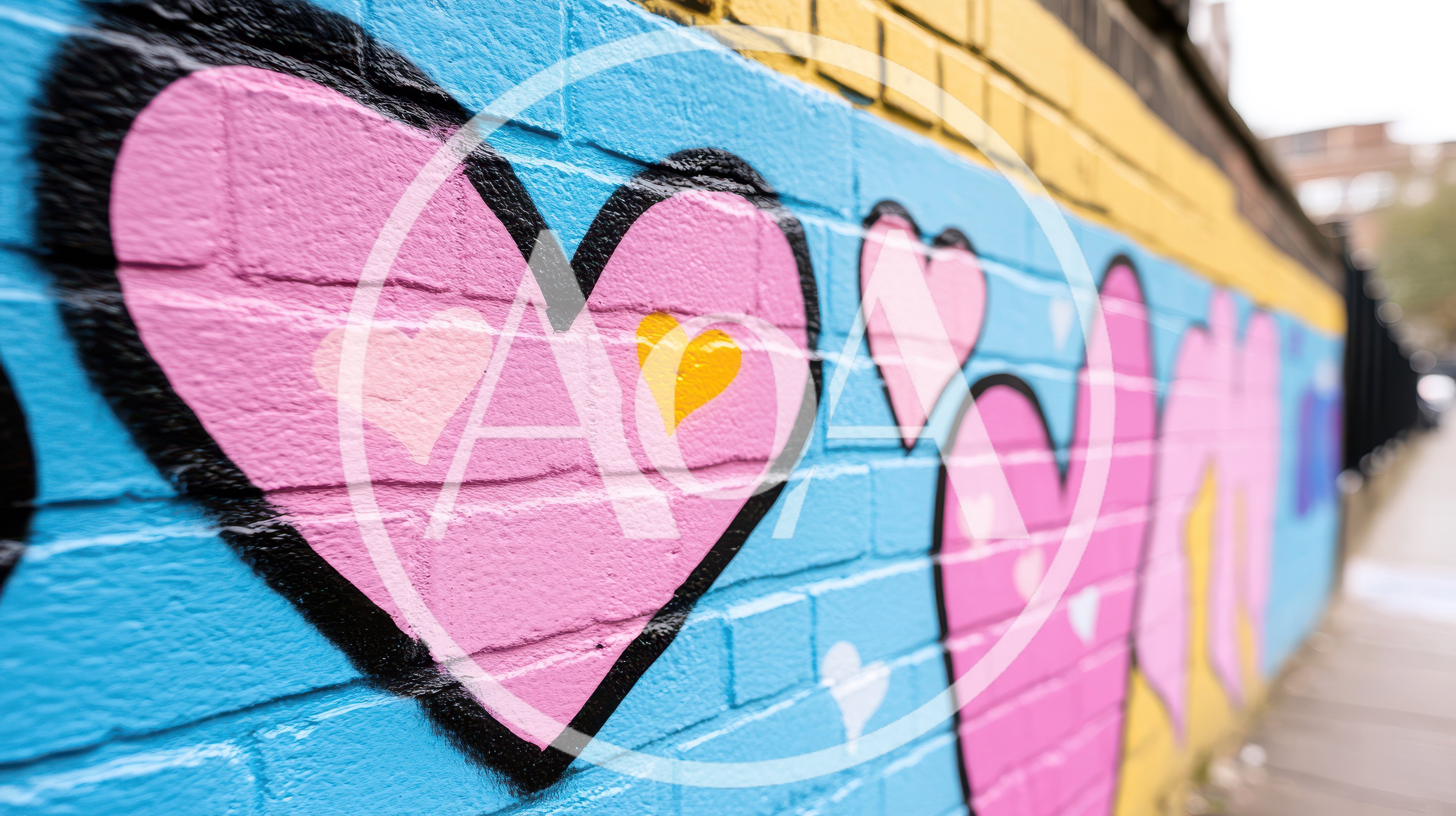 Colorful Heart Graffiti Mural On Brick Wall