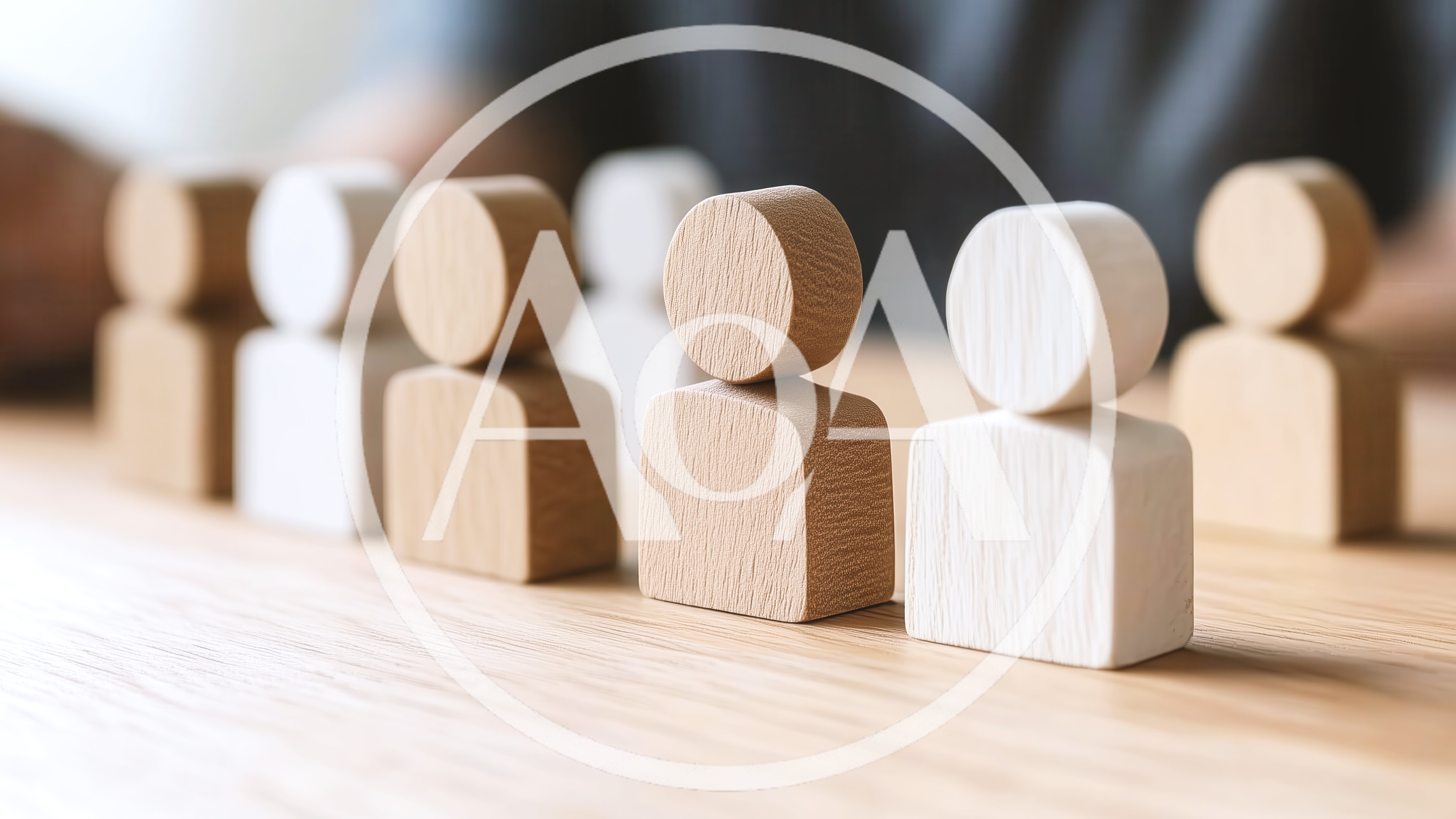 Wooden Human Figurines Arranged On A Wooden Table
