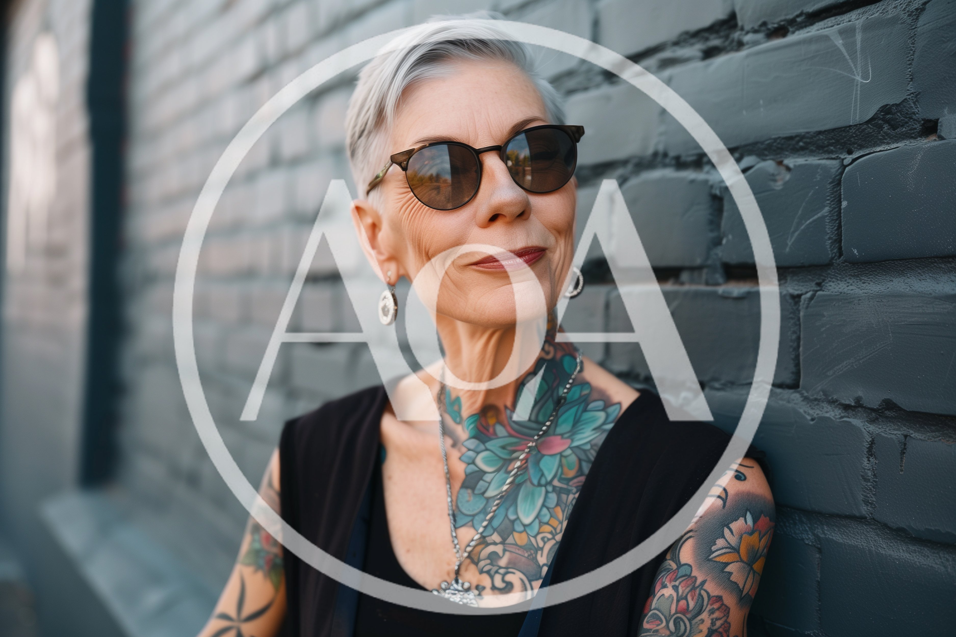 Stylish Older Woman With Tattoos Leaning Against Brick Wall