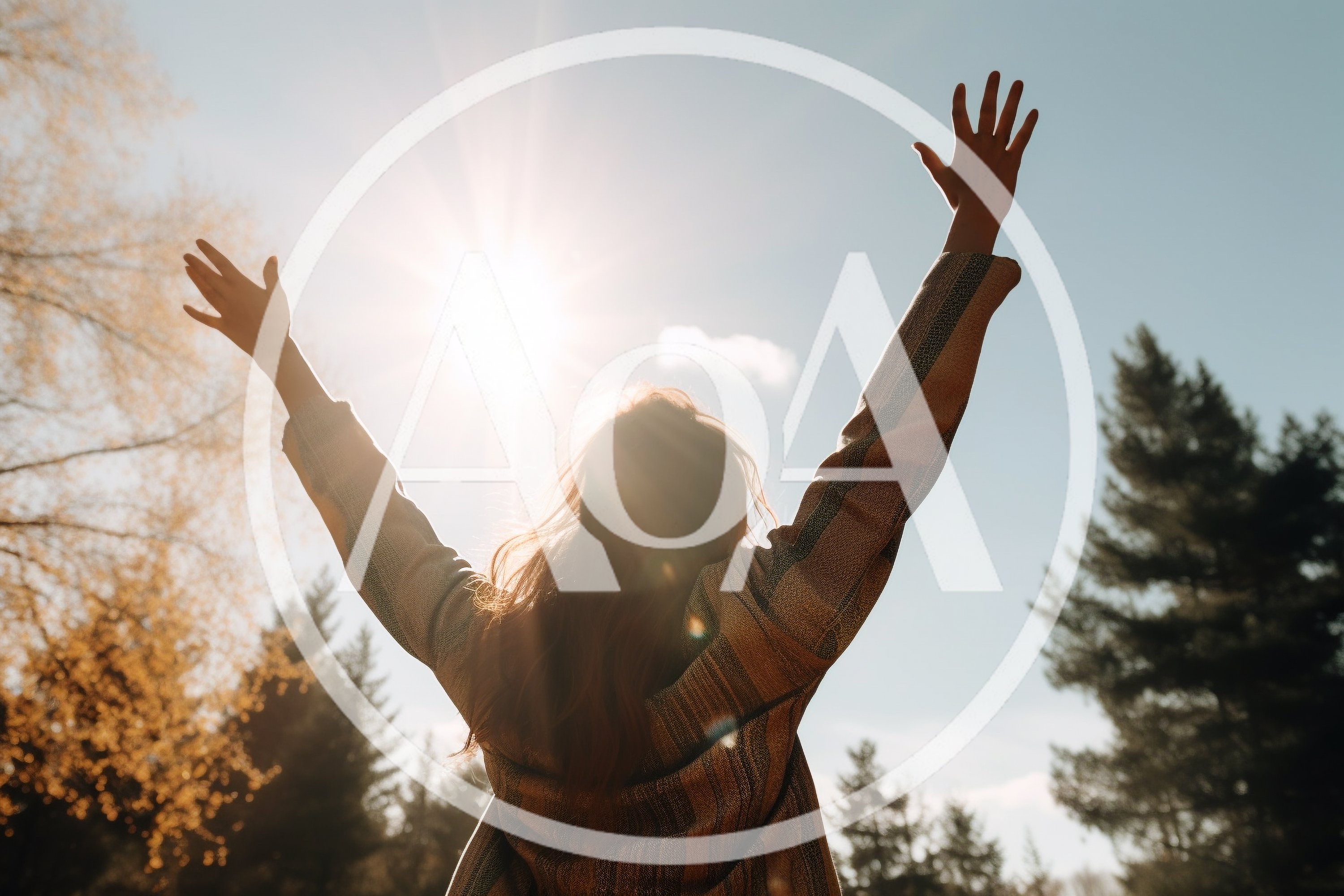 Woman Standing With Arms Raised Towards The Sun