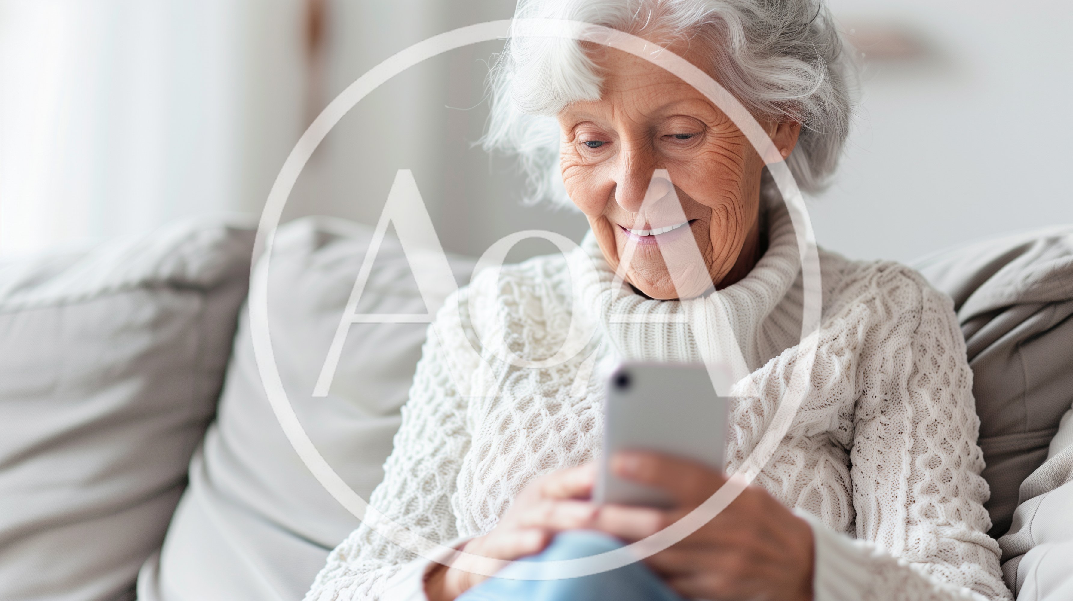Senior Woman Using Smartphone On Sofa