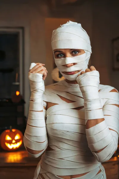Woman Dressed As A Mummy In Boxing Stance