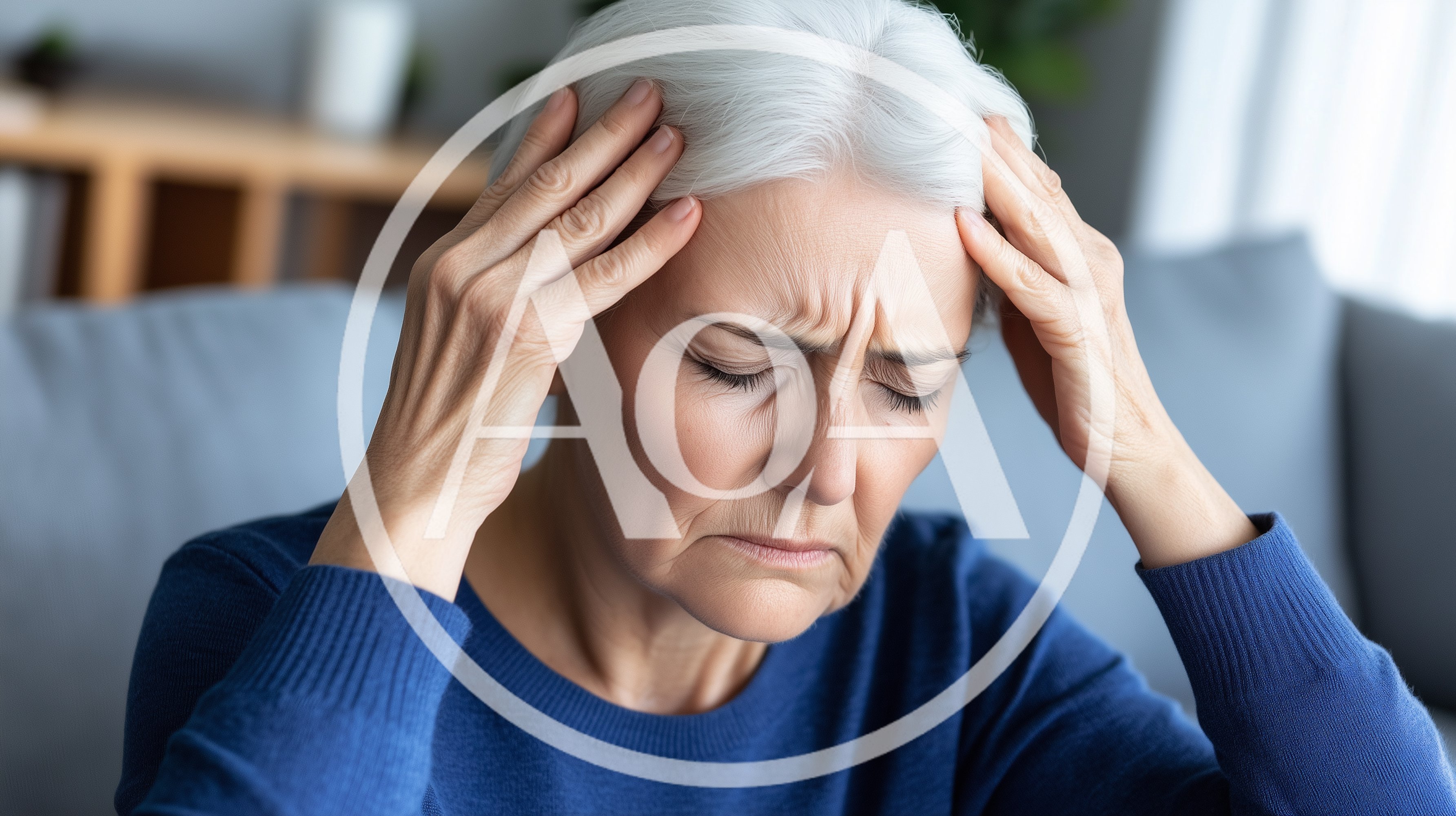 Senior Woman Suffering From A Severe Headache