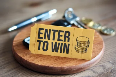 Enter To Win Ticket On Wooden Surface