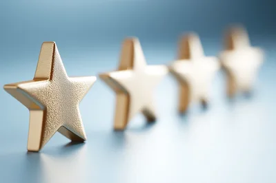 Four Golden Stars Standing In A Row