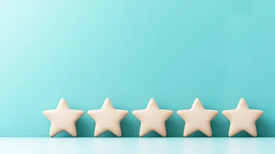 Five Beige Stars Arranged In A Row