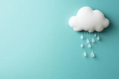 White Cloud With Hanging Raindrops On Teal Background