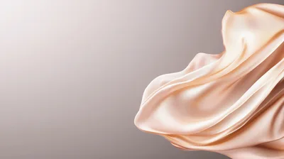 Flowing Champagne Colored Silk Fabric Background