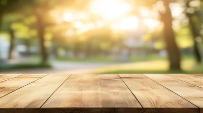 Empty Wooden Table Surface With Blurred Park Background