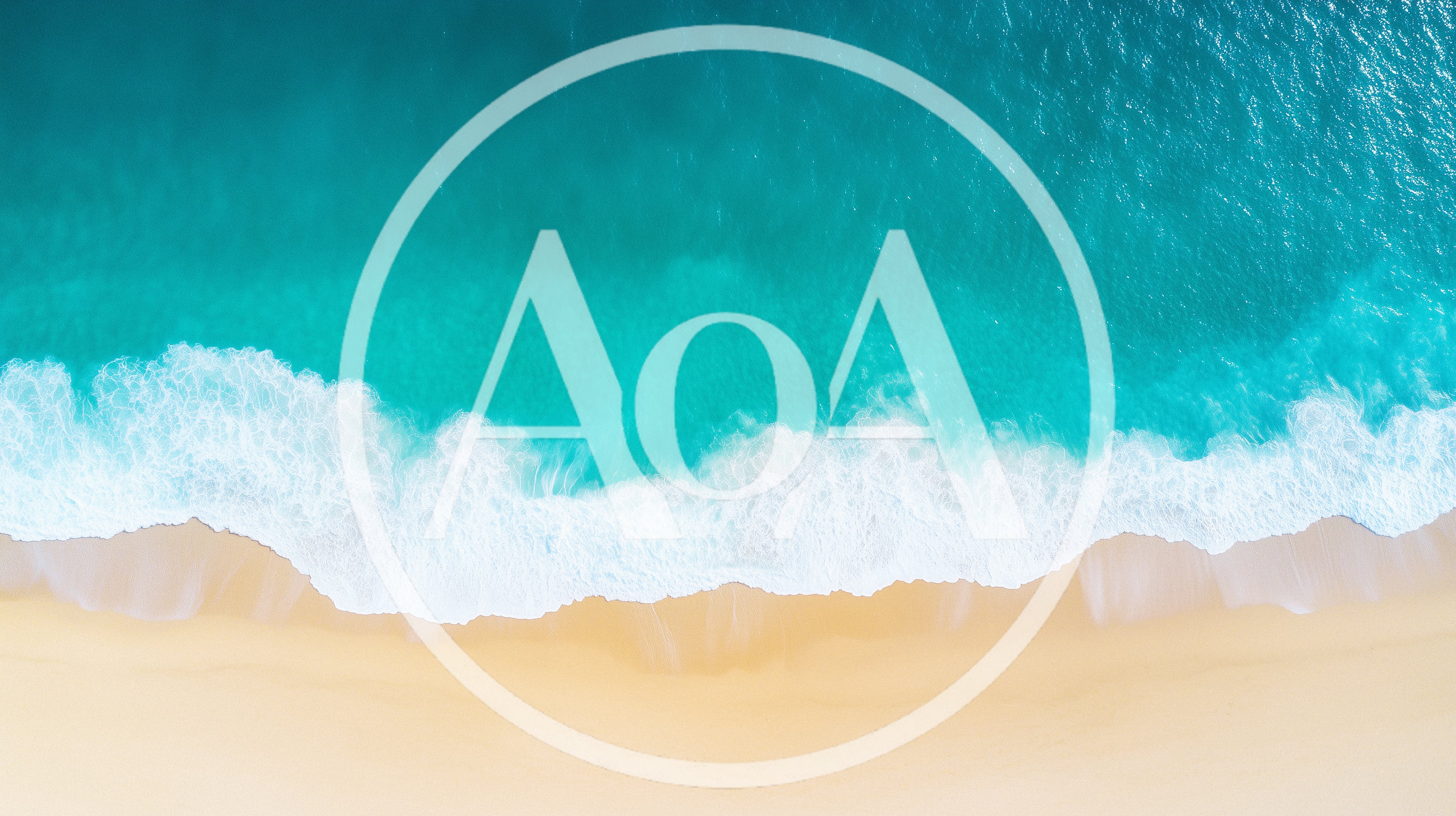 Aerial View Of Turquoise Ocean Waves Hitting Sandy Beach