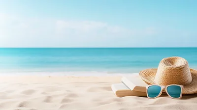 Straw Hat Sunglasses And Books On Sandy Beach
