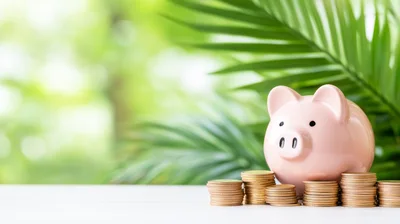 Pink Piggy Bank With Stacks Of Gold Coins