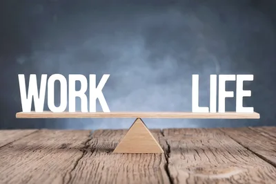 Work Life Balance Concept On Wooden Scales