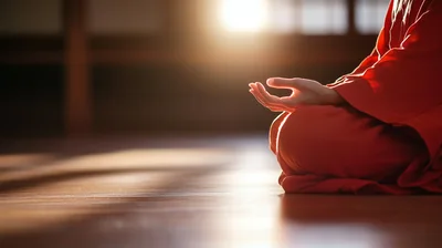 Buddhist Monk Meditating In A Traditional Temple