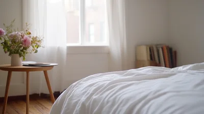 Cozy Bedroom Interior With Flowers And Bedding