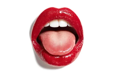 Close Up Of Woman With Red Lipstick Sticking Out Tongue