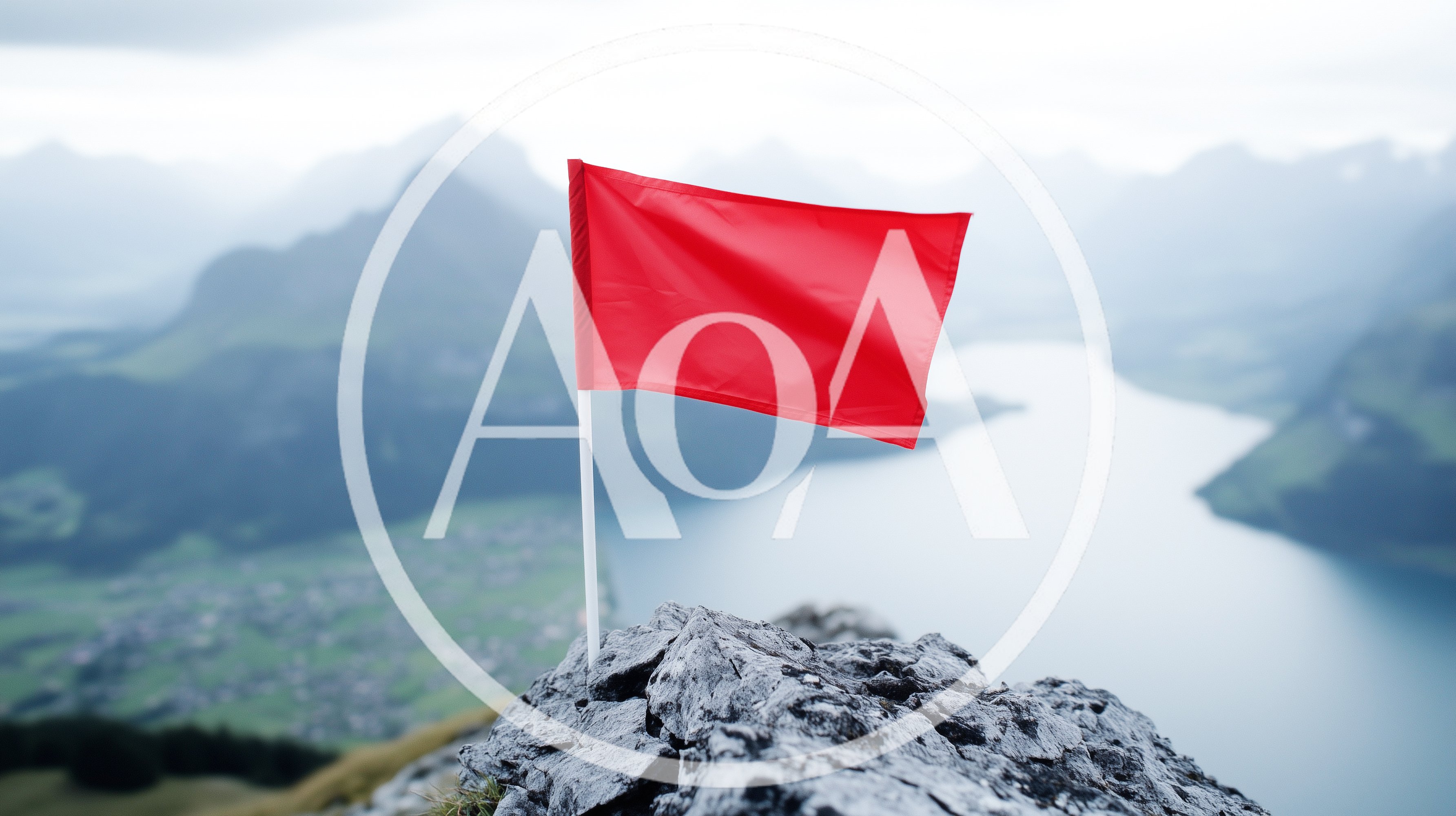 Red Flag Planted On A Rocky Mountain Peak