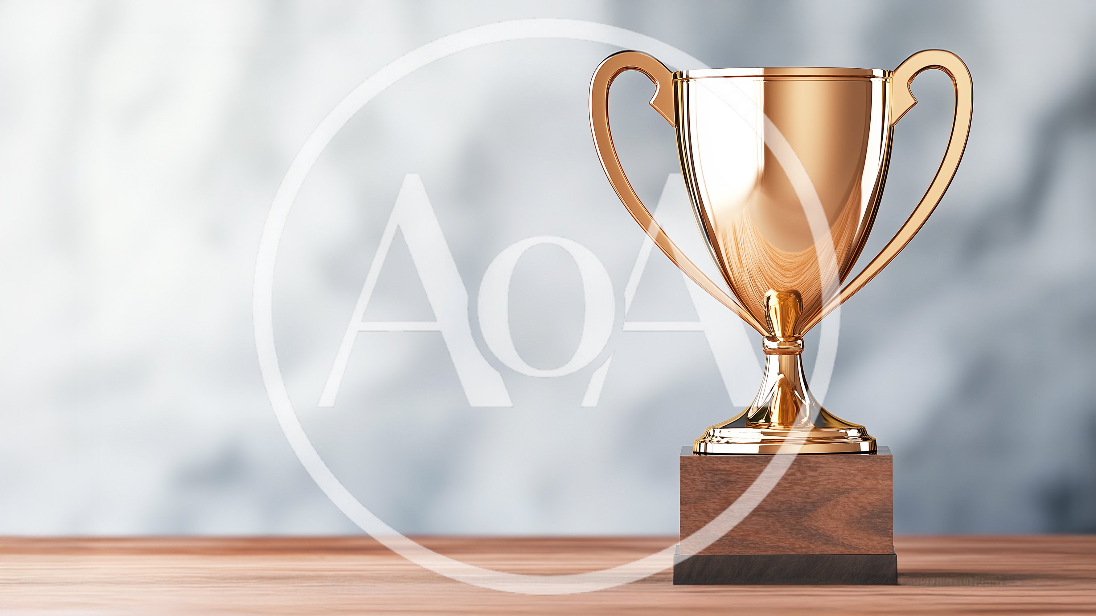 Golden Trophy Cup On Wooden Surface