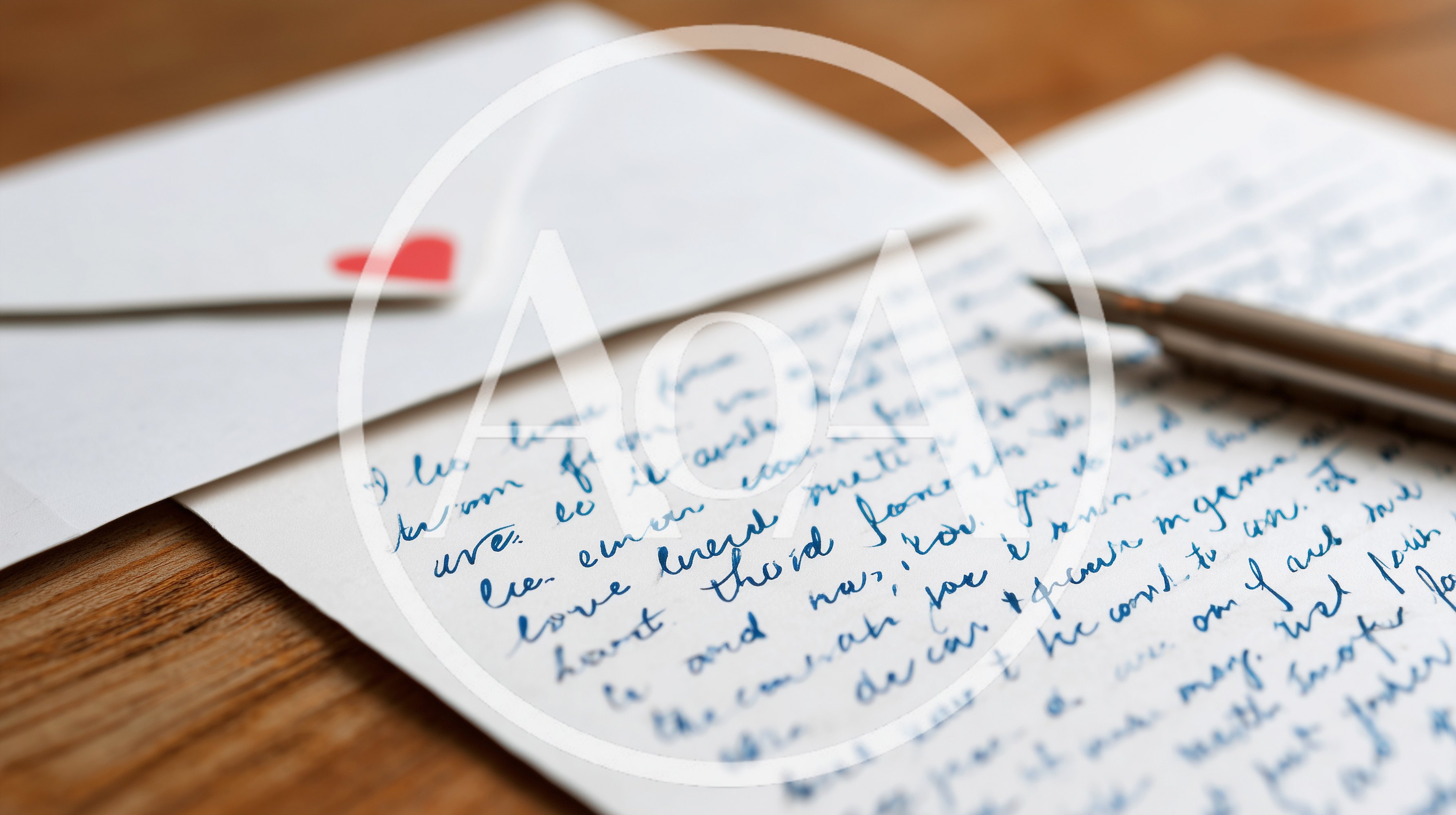 Handwritten Love Letter With Fountain Pen On Wooden Table