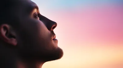 Profile View Of A Young Man Looking Upwards
