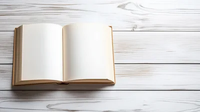 Open Blank Book On White Wooden Table