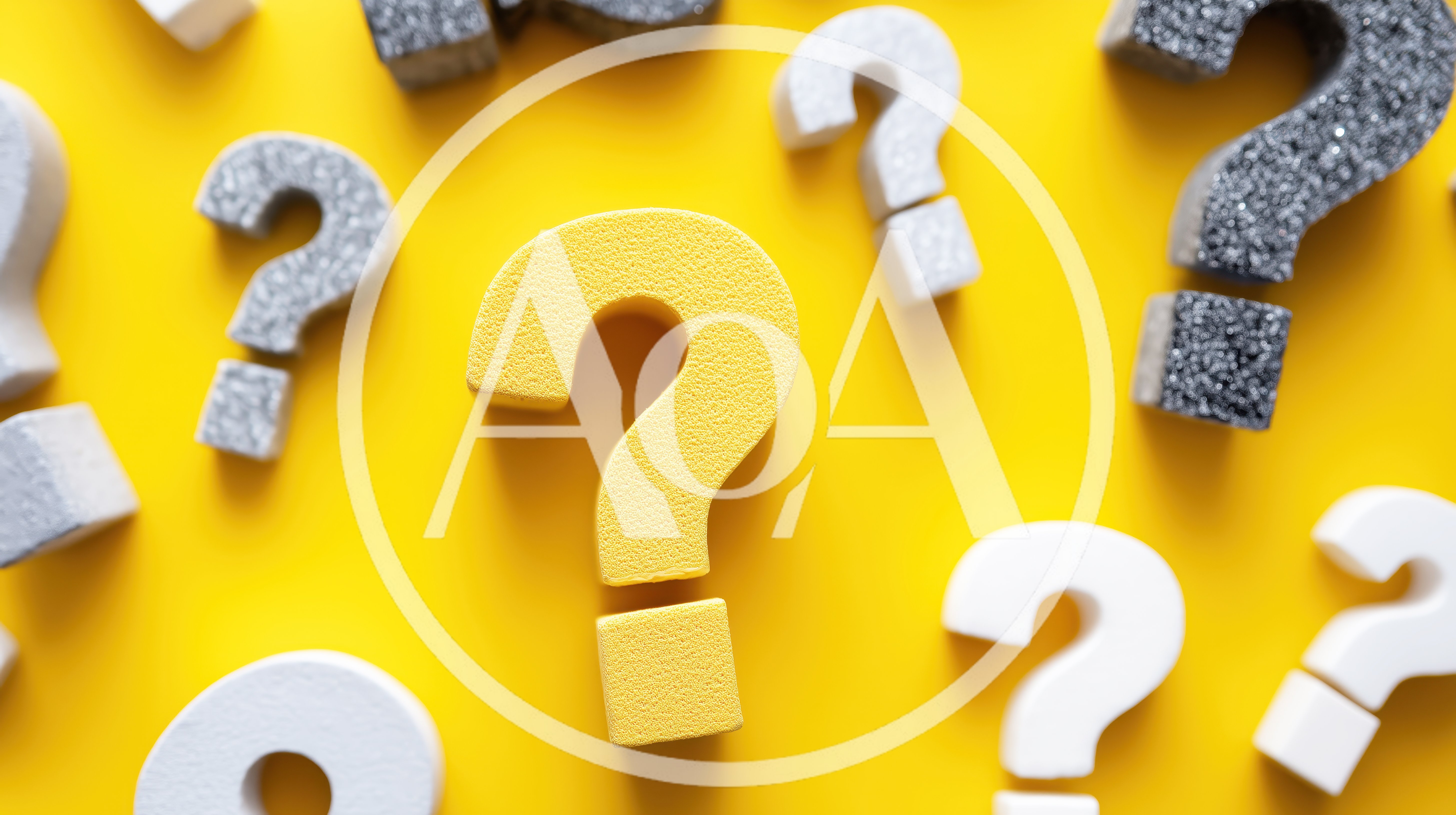Assorted Question Mark Symbols on Yellow Background