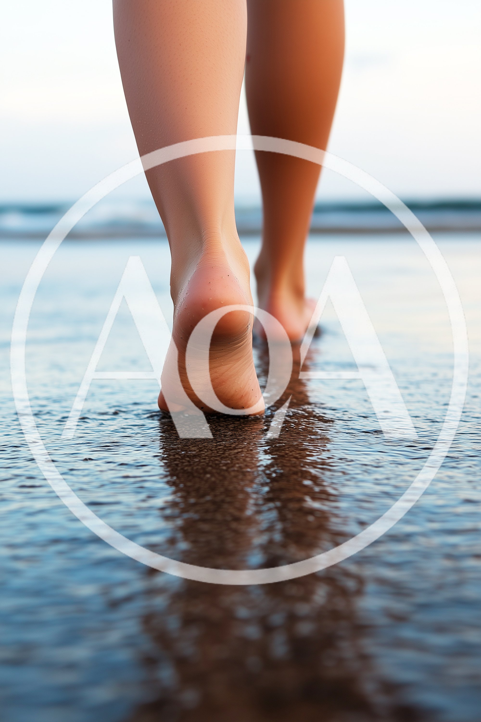 Barefoot Woman Walking Along The Wet Sandy Beach