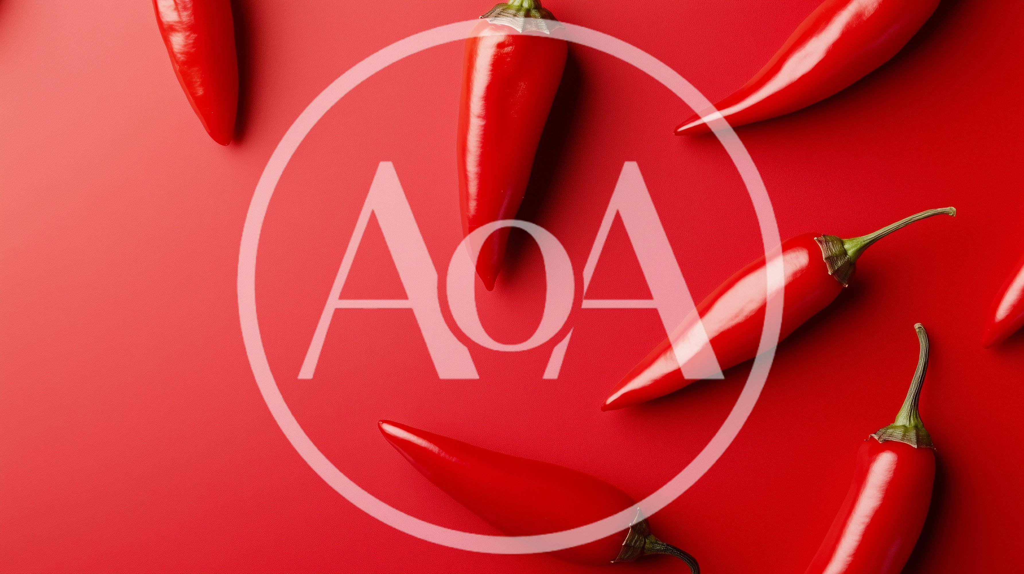 Fresh Red Chili Peppers On Red Background