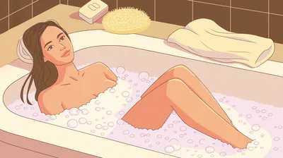 Young Woman Relaxing In A Bubble Bath