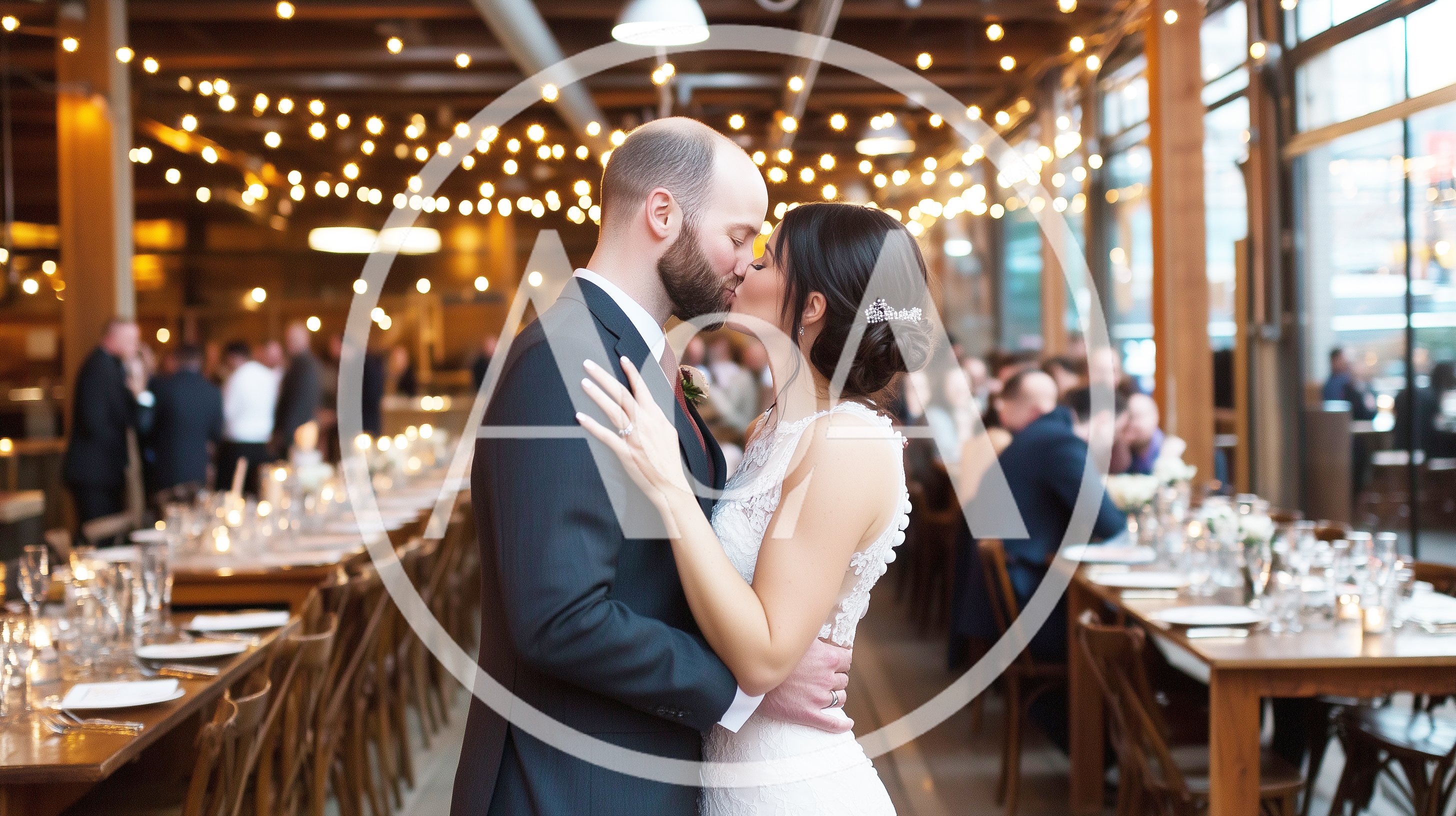 Newlywed Couple Kissing at Wedding Reception