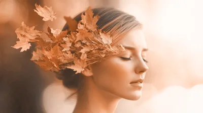 Portrait Of A Woman With Autumn Leaves