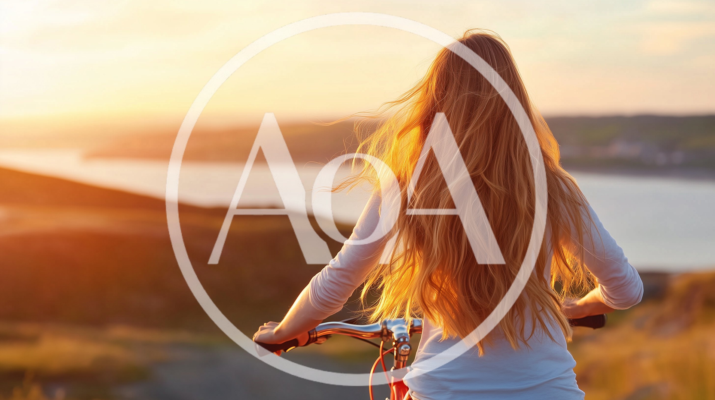 Woman Riding Bicycle At Sunset Overlooking The Sea