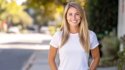 Portrait Of A Smiling Blonde Woman Outdoors