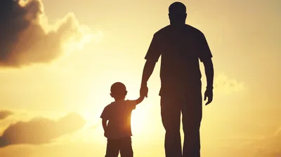 Father and Son Walking Together at Sunset