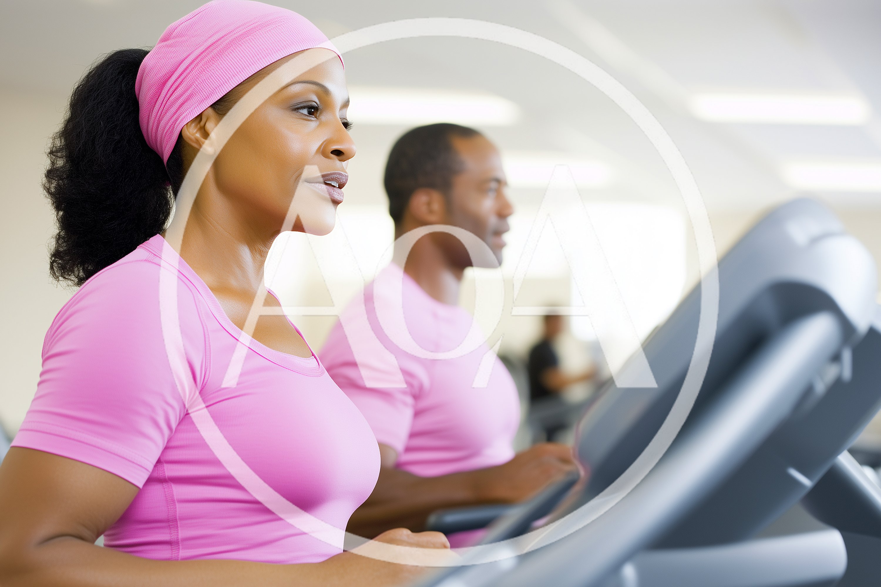 African American Couple Exercising on Treadmills at Gym