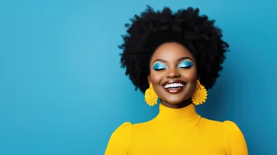 Smiling Woman With Afro Hair And Yellow Top