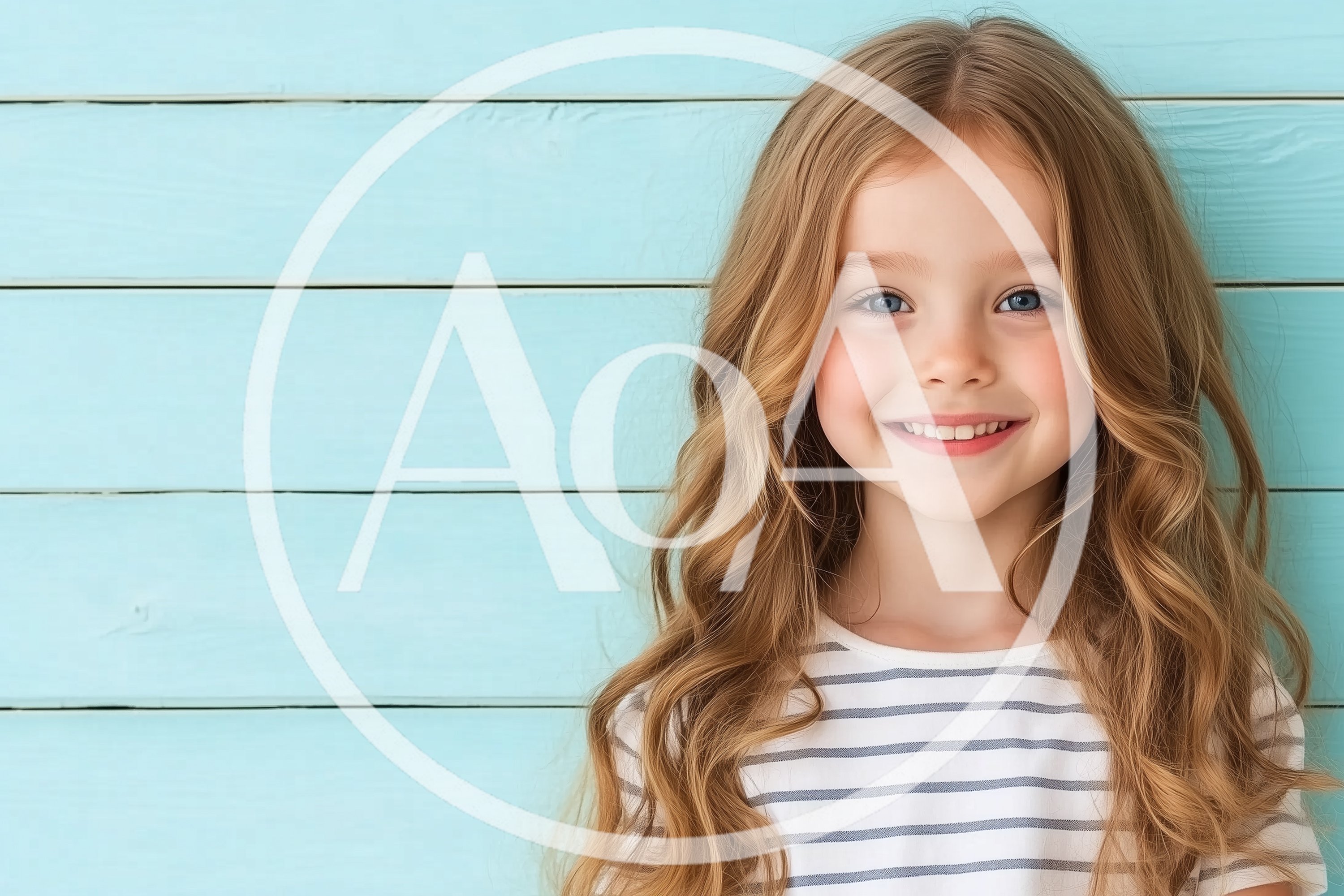 Portrait Of A Smiling Young Girl With Long Wavy Hair