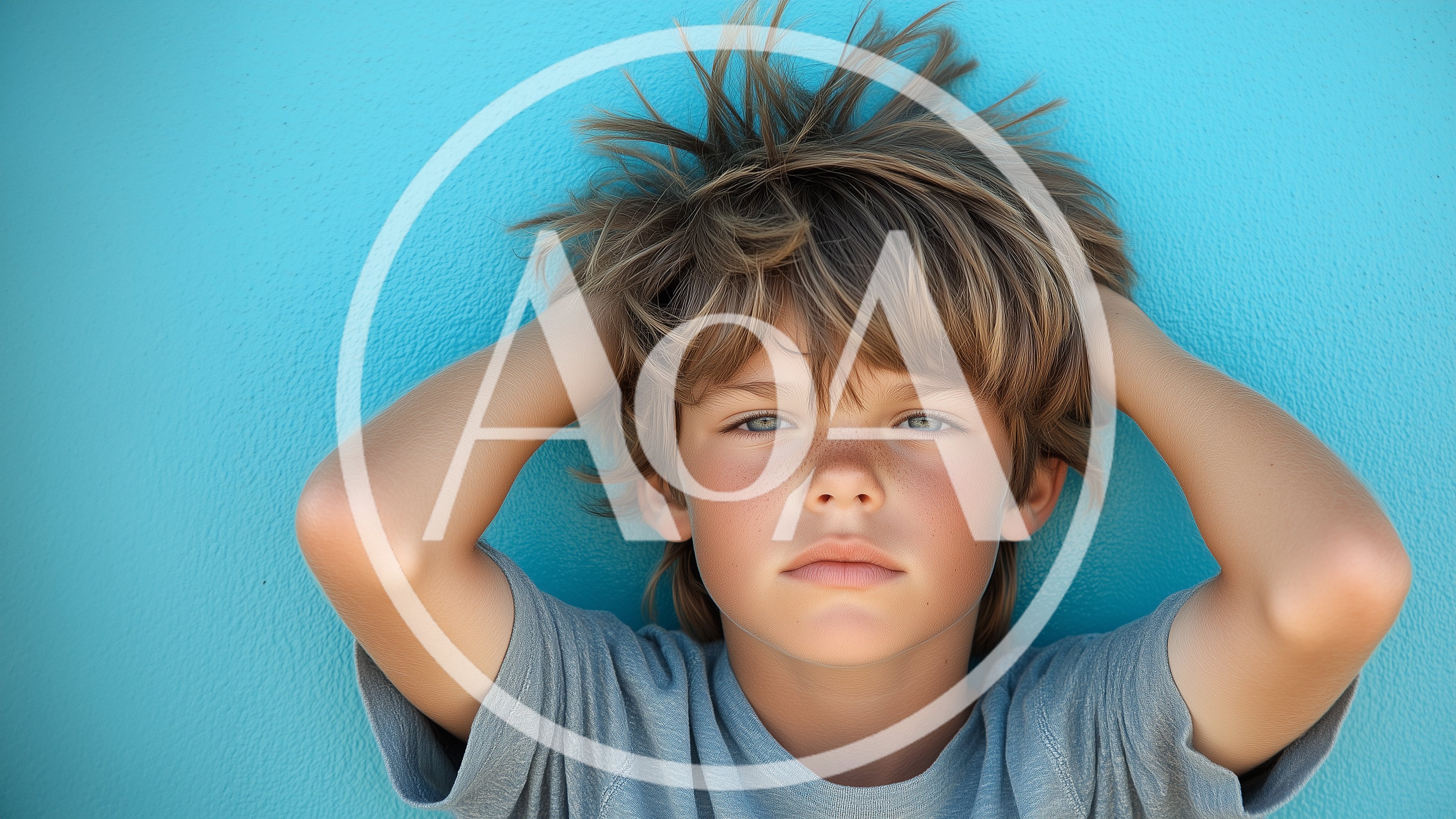 Portrait Of A Young Boy With Messy Hair