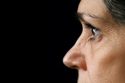Close Up Profile Of Mature Woman Looking Away