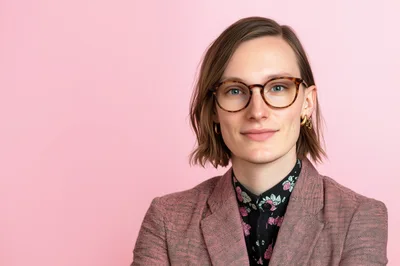 Portrait Of A Young Person In A Pink Blazer