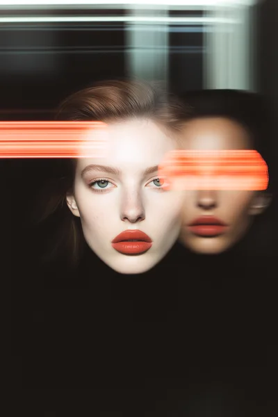 Double Exposure Portrait Of A Woman With Motion Blur
