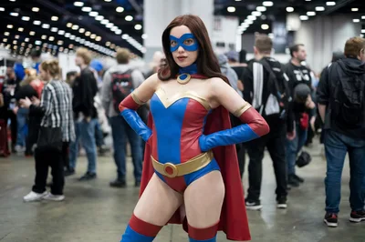 Cosplayer Dressed As A Superhero At A Convention
