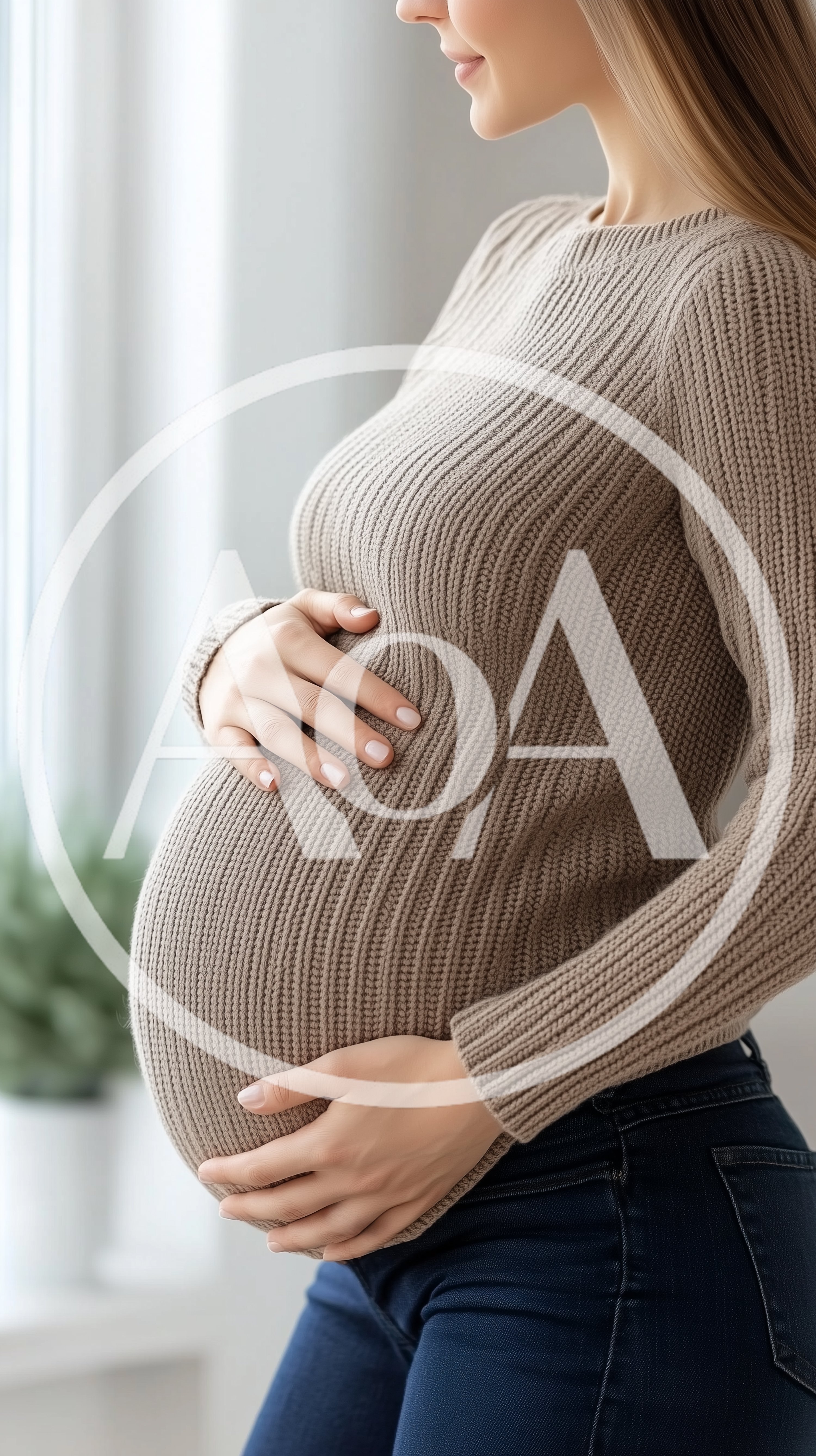 Pregnant Woman Holding Her Baby Bump