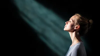 Profile Portrait of a Woman Relaxing in Soft Light