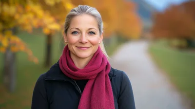 Portrait Of A Smiling Woman In Autumn Park