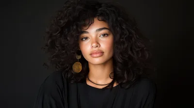 Portrait Of A Young Woman With Curly Hair