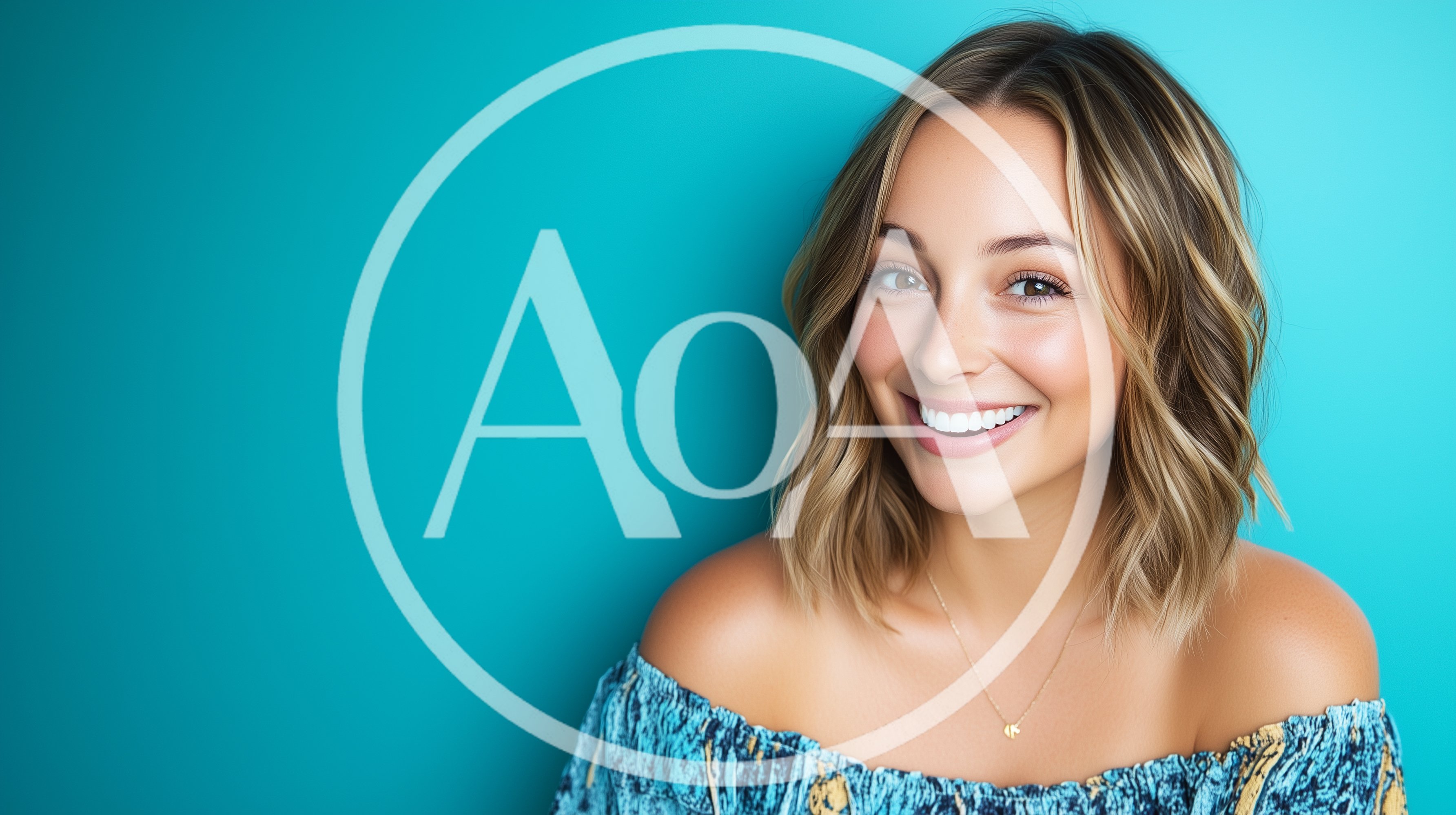 Smiling Young Woman With Blonde Highlights Against Teal Background